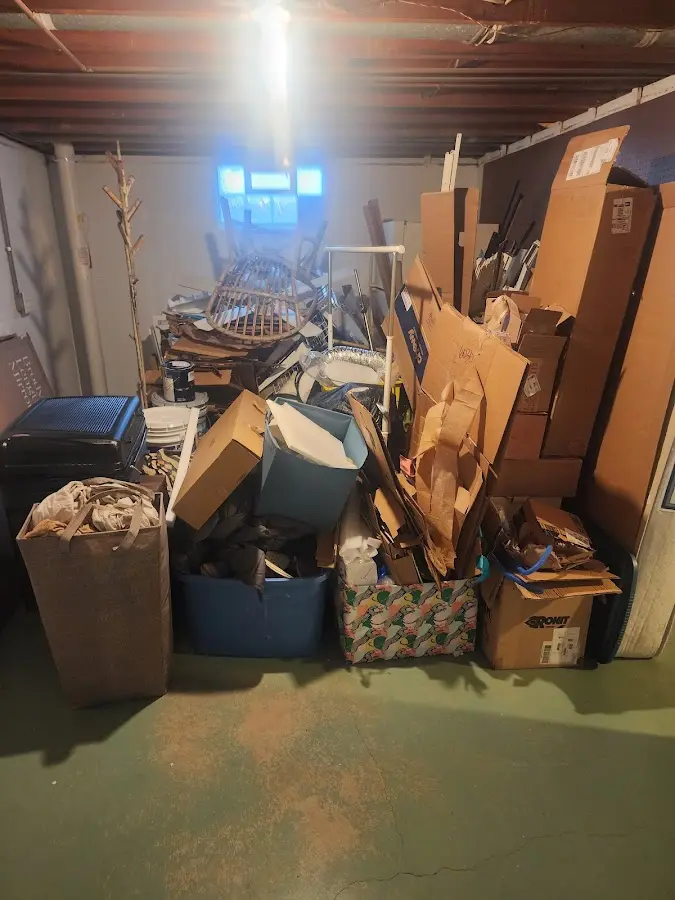 Roll-off dumpster container at job site for 15 Yard Dumpster Rental in Dracut